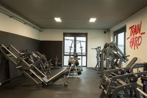 Strength area with leg press machines at Revex beFIT